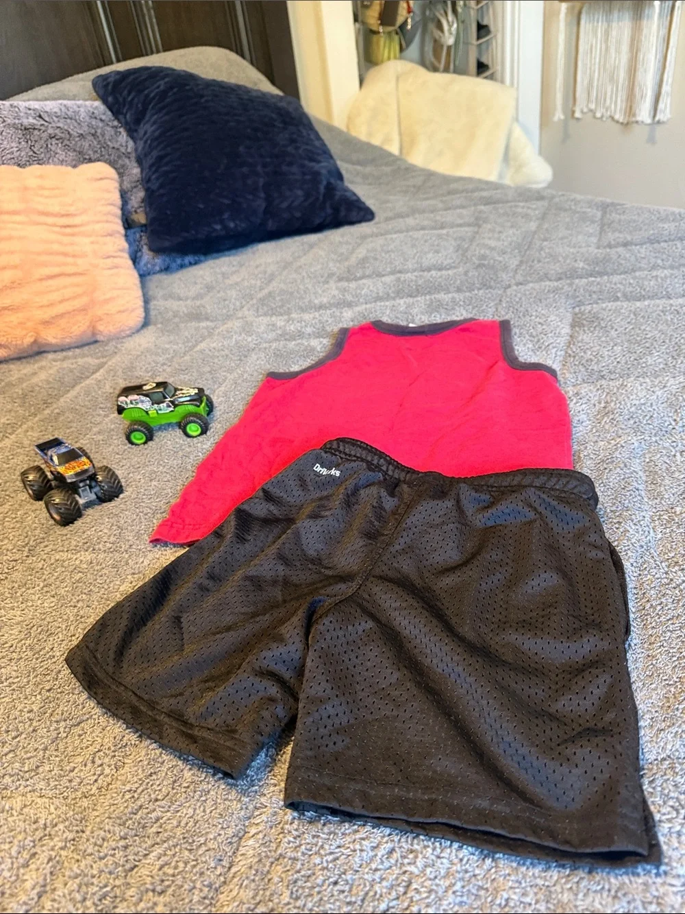 Red Shark Tank Top with Black Athletic Shorts